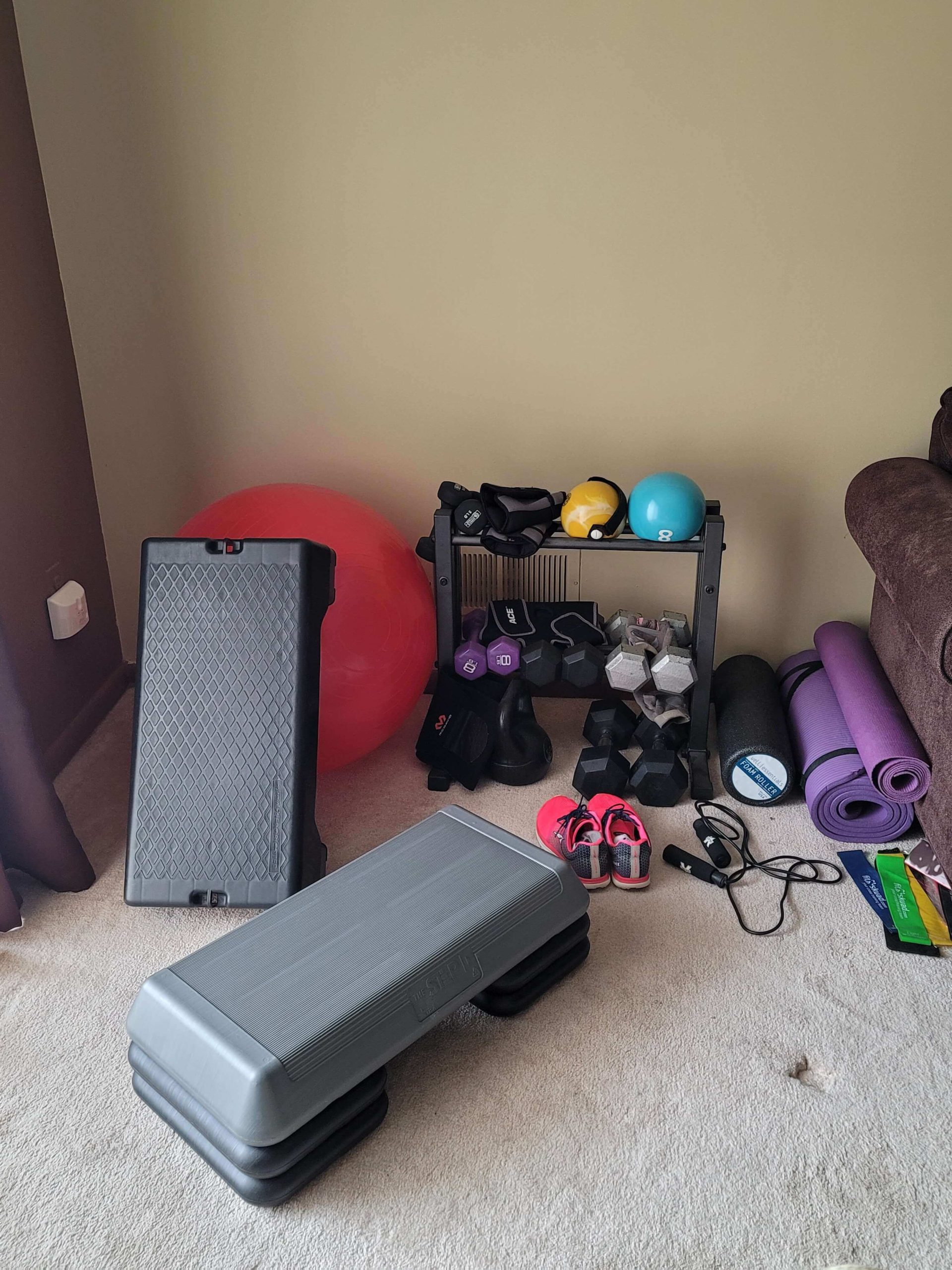 working out at home gym equipment setup